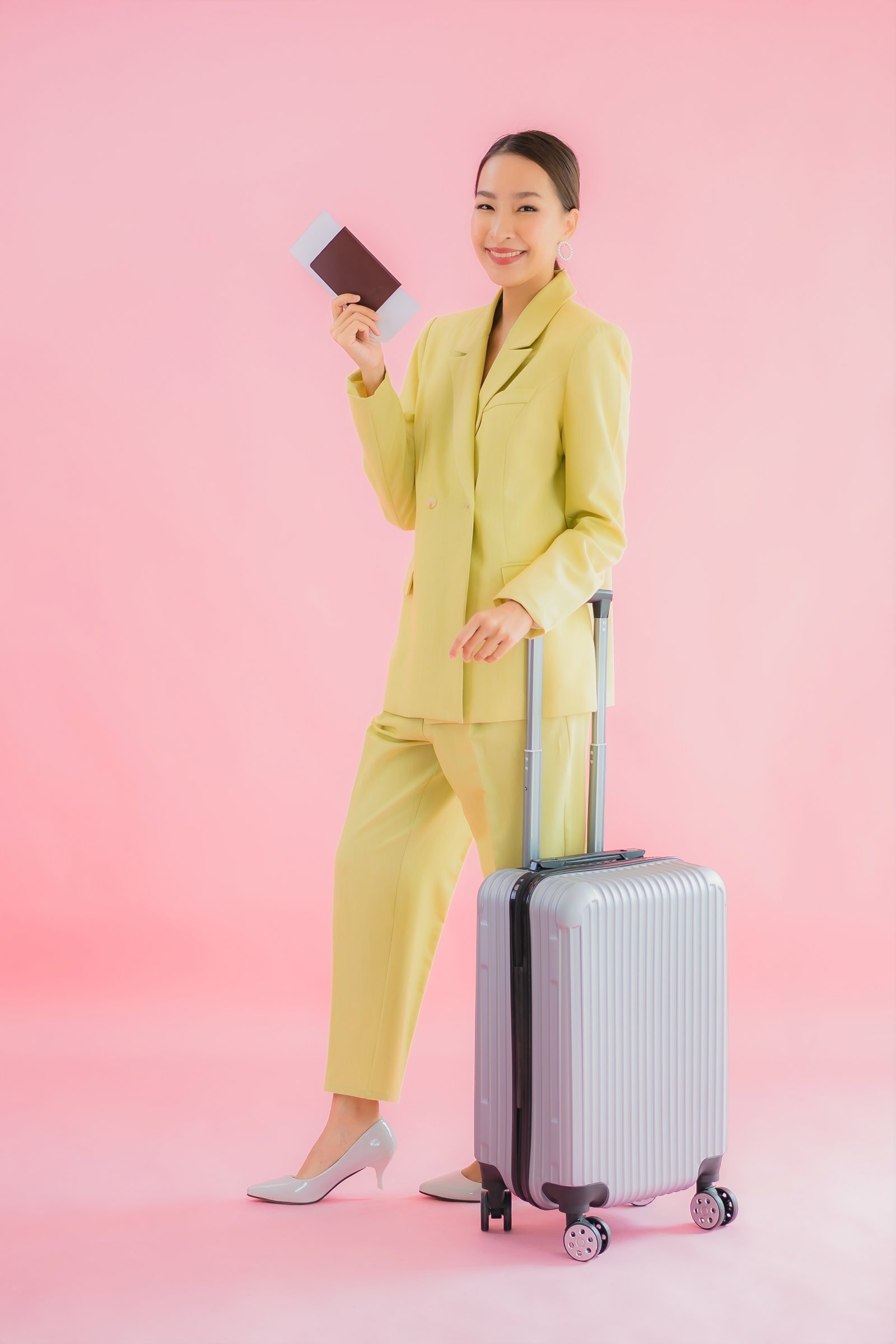 Portrait beautiful young asian business woman with luggage bag a